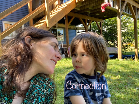 staff with child showing "connection"